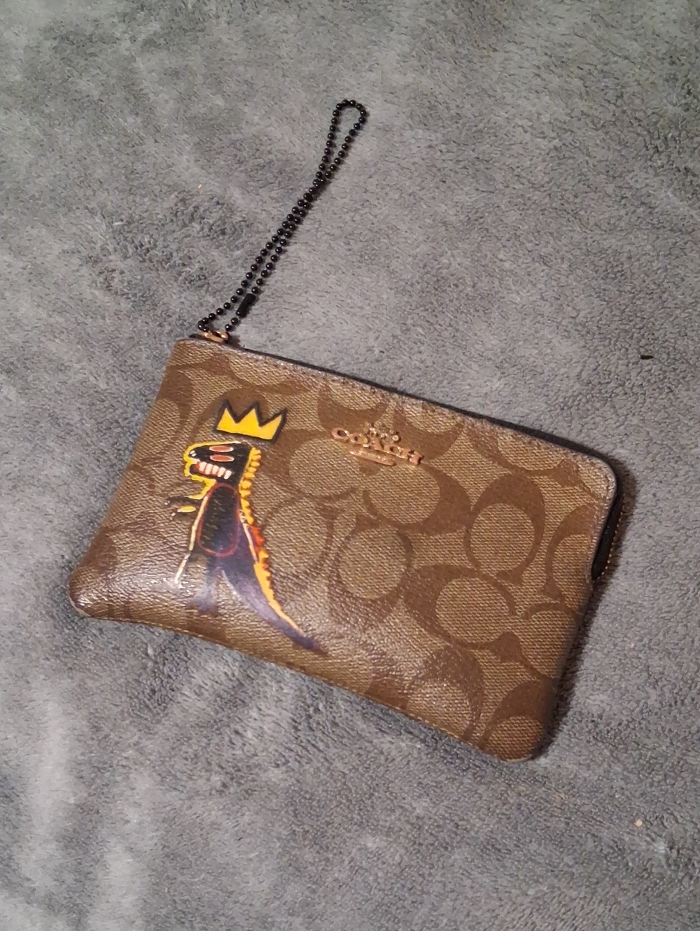 Coach Brown Signature Canvas Wristlet with Graphic Dino Detail